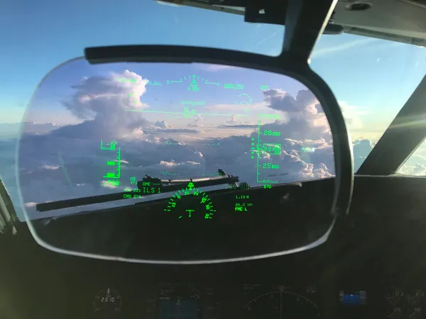 Boeing 737 HUD above the clouds at altitude