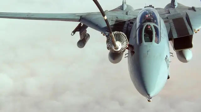 Paco flying an F-14 Tomcat, plugging into a tanker for aerial refueling