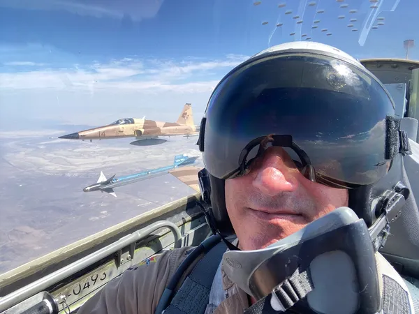 F-5 Tiger II in formation over the desert