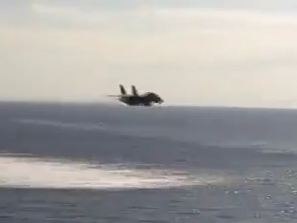 F-14 Tomcat low over the ocean