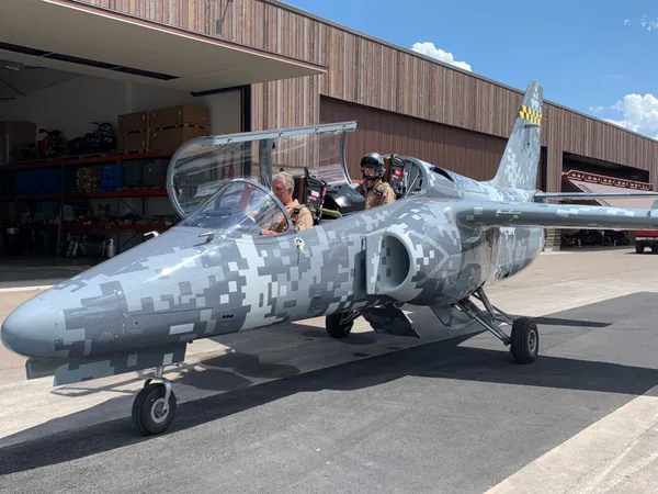S-211 in digital camo at the hangar