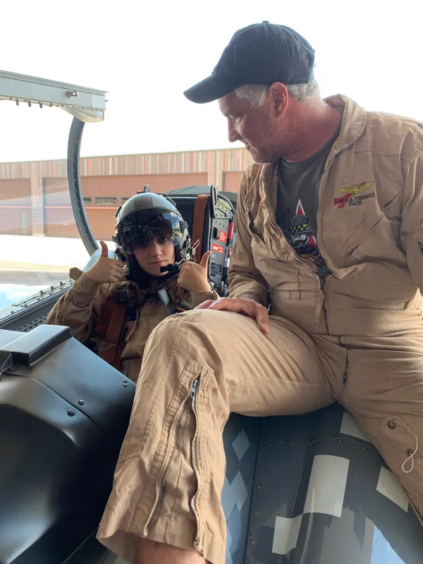 Young pilot in the S-211 cockpit, thumbs up